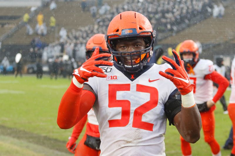 Oct 26, 2019; West Lafayette, IN, USA; Illinois Fighting Illini defensive lineman Aye Shogbonyo (52) reacts after the game after defeating the Purdue Boilermakers at Ross-Ade Stadium. Mandatory Credit: Brian Spurlock-USA TODAY Sports