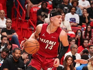 MIAMI, FL - DECEMBER 25:  Tyler Herro #14 of the Miami Heat goes to the basket during the game on December 25, 2023 at Kaseya Center Arena in Miami, Florida. NOTE TO USER: User expressly acknowledges and agrees that, by downloading and or using this Photograph, user is consenting to the terms and conditions of the Getty Images License Agreement. Mandatory Copyright Notice: Copyright 2023 NBAE (Photo by Issac Baldizon/NBAE via Getty Images)