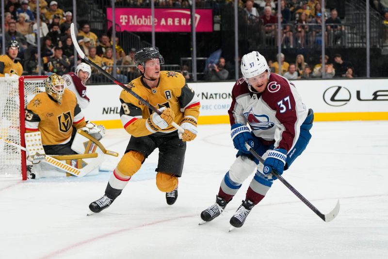 Oct 9, 2024; Las Vegas, Nevada, USA; Colorado Avalanche center Casey Mittlestadt (37) skates against Vegas Golden Knights center Jack Eichel (9) during the third period at T-Mobile Arena. Mandatory Credit: Lucas Peltier-Imagn Images