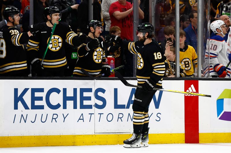 Mar 5, 2024; Boston, Massachusetts, USA; Boston Bruins center Pavel Zacha (18) is congratulated at the bench after his goal against the Edmonton Oilers during the third period at TD Garden. Mandatory Credit: Winslow Townson-USA TODAY Sports