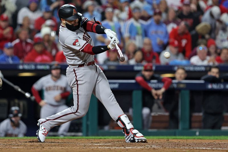 Oct 24, 2023; Philadelphia, Pennsylvania, USA; Arizona Diamondbacks third baseman Emmanuel Rivera (15) this a single against the Philadelphia Phillies in the fifth inning for game seven of the NLCS for the 2023 MLB playoffs at Citizens Bank Park. Mandatory Credit: Bill Streicher-USA TODAY Sports