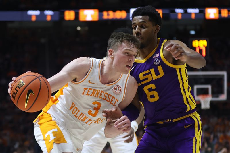 Feb 7, 2024; Knoxville, Tennessee, USA; Tennessee Volunteers guard Dalton Knecht (3) moves the ball against LSU Tigers guard Jordan Wright (6) during the second half at Thompson-Boling Arena at Food City Center. Mandatory Credit: Randy Sartin-USA TODAY Sports