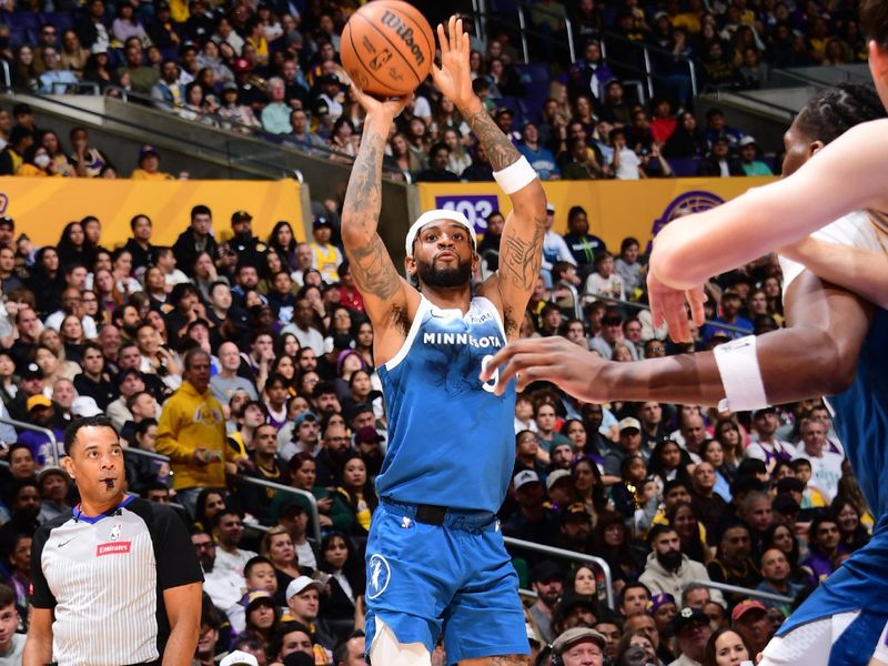 LOS ANGELES, CA - MARCH 10: Nickeil Alexander-Walker #9 of the Minnesota Timberwolves shoots the ball during the game against the Los Angeles Lakers on March 10, 2024 at Crypto.Com Arena in Los Angeles, California. NOTE TO USER: User expressly acknowledges and agrees that, by downloading and/or using this Photograph, user is consenting to the terms and conditions of the Getty Images License Agreement. Mandatory Copyright Notice: Copyright 2024 NBAE (Photo by Adam Pantozzi/NBAE via Getty Images)