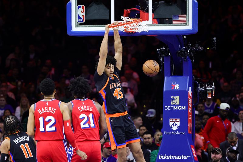 PHILADELPHIA, PENNSYLVANIA - FEBRUARY 10: Jericho Sims #45 of the New York Knicks dunks during the second quarter against the Philadelphia 76ers at Wells Fargo Center on February 10, 2023 in Philadelphia, Pennsylvania. NOTE TO USER: User expressly acknowledges and agrees that, by downloading and or using this photograph, User is consenting to the terms and conditions of the Getty Images License Agreement. (Photo by Tim Nwachukwu/Getty Images)