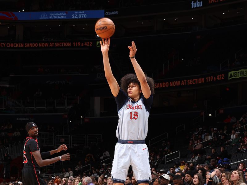 WASHINGTON, DC -?JANUARY 29: Kyshawn George #18 of the Washington Wizards three point basket during the game against the Toronto Raptors on January 29, 2025 at Capital One Arena in Washington, DC. NOTE TO USER: User expressly acknowledges and agrees that, by downloading and or using this Photograph, user is consenting to the terms and conditions of the Getty Images License Agreement. Mandatory Copyright Notice: Copyright 2025 NBAE (Photo by Stephen Gosling/NBAE via Getty Images)