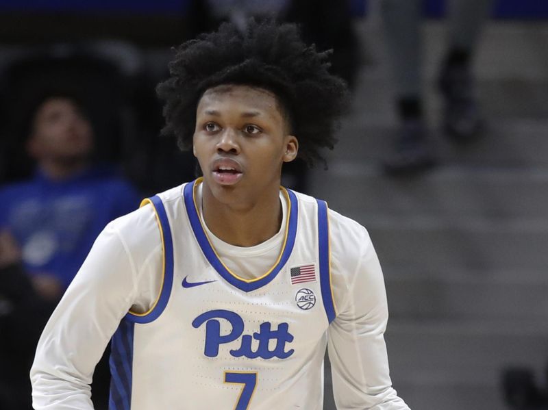 Dec 20, 2023; Pittsburgh, Pennsylvania, USA; Pittsburgh Panthers guard Carlton Carrington (7) dribbles the ball against the IPFW Mastodons during the second half at the Petersen Events Center. Pittsburgh won 62-48. Mandatory Credit: Charles LeClaire-USA TODAY Sports