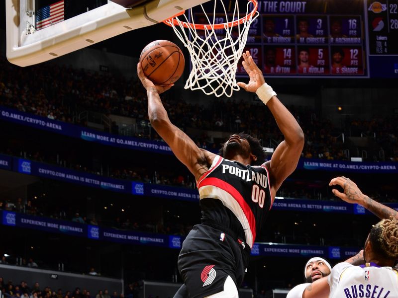 LOS ANGELES, CA - DECEMBER 8: Scoot Henderson #00 of the Portland Trail Blazers drives to the basket during the game against the Los Angeles Lakers on December 8, 2024 at Crypto.Com Arena in Los Angeles, California. NOTE TO USER: User expressly acknowledges and agrees that, by downloading and/or using this Photograph, user is consenting to the terms and conditions of the Getty Images License Agreement. Mandatory Copyright Notice: Copyright 2024 NBAE (Photo by Adam Pantozzi/NBAE via Getty Images)