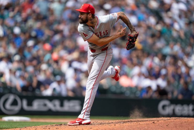 Jul 24, 2024; Seattle, Washington, USA; Los Angeles Angels reliever Hans Crouse (52) delivers a pitch during the seventh inning Mariners at T-Mobile Park. Mandatory Credit: Stephen Brashear-USA TODAY Sports