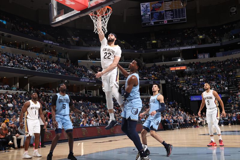 MEMPHIS, TN - FEBRUARY 12: Larry Nance Jr. #22 of the New Orleans Pelicans dunks the ball during the game against the Memphis Grizzlies on February 12, 2024 at FedExForum in Memphis, Tennessee. NOTE TO USER: User expressly acknowledges and agrees that, by downloading and or using this photograph, User is consenting to the terms and conditions of the Getty Images License Agreement. Mandatory Copyright Notice: Copyright 2024 NBAE (Photo by Joe Murphy/NBAE via Getty Images)