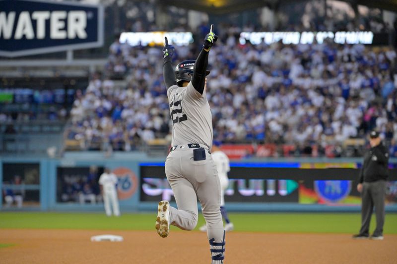 Oct 26, 2024; Los Angeles, California, USA; New York Yankees outfielder Juan Soto (22) celebrates after hitting a solo home run in the third inning against the Los Angeles Dodgers during game two of the 2024 MLB World Series at Dodger Stadium. Mandatory Credit: Jayne Kamin-Oncea-Imagn Images