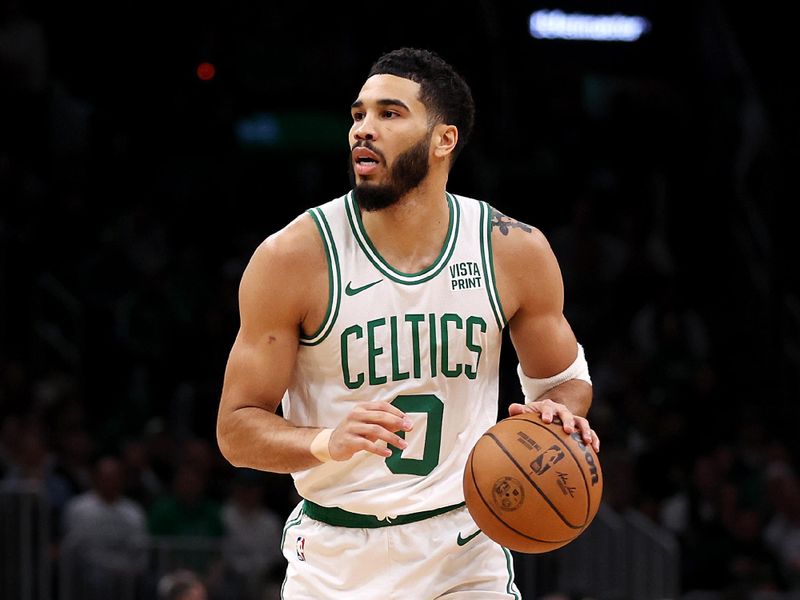 BOSTON, MASSACHUSETTS - JANUARY 05: Jayson Tatum #0 of the Boston Celtics dribbles downcourt against the Utah Jazz during the first quarter at TD Garden on January 05, 2024 in Boston, Massachusetts. NOTE TO USER: User expressly acknowledges and agrees that, by downloading and or using this photograph, user is consenting to the terms and conditions of the Getty Images License Agreement.  (Photo by Maddie Meyer/Getty Images)