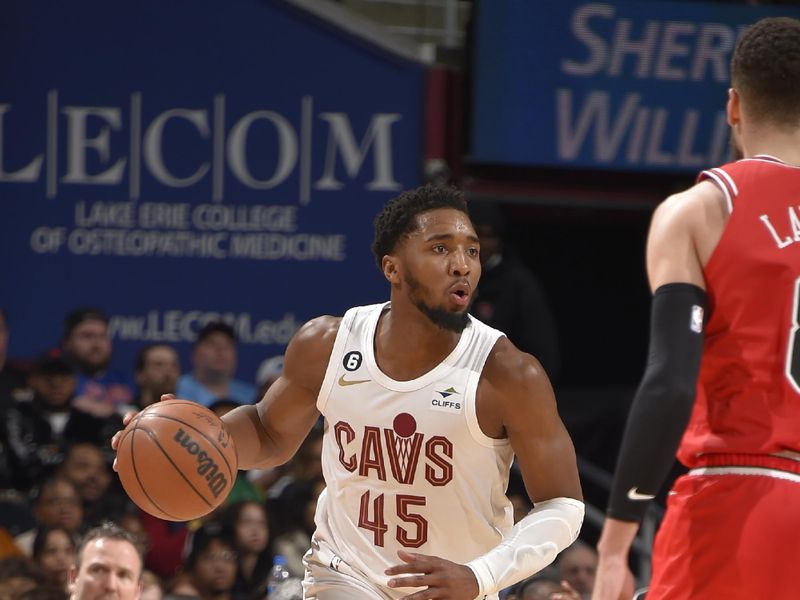 CLEVELAND, OH - FEBRUARY 11: Donovan Mitchell #45 of the Cleveland Cavaliers dribbles the ball during the game against the Chicago Bulls on February 11, 2023 at Rocket Mortgage FieldHouse in Cleveland, Ohio. NOTE TO USER: User expressly acknowledges and agrees that, by downloading and/or using this Photograph, user is consenting to the terms and conditions of the Getty Images License Agreement. Mandatory Copyright Notice: Copyright 2023 NBAE (Photo by David Liam Kyle/NBAE via Getty Images)