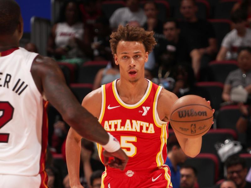 MIAMI, FL - OCTOBER 16: Dyson Daniels #5 of the Atlanta Hawks dribbles the ball during the game against the Miami Heat on October 16, 2024 at Miami-Dade Arena in Miami, Florida. NOTE TO USER: User expressly acknowledges and agrees that, by downloading and or using this Photograph, user is consenting to the terms and conditions of the Getty Images License Agreement. Mandatory Copyright Notice: Copyright 2024 NBAE (Photo by Issac Baldizon/NBAE via Getty Images)