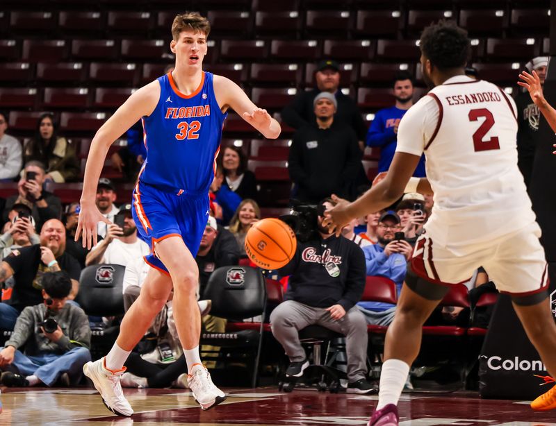 Jan 28, 2026; Columbia, South Carolina, USA;  Florida Gators center Olivier Rioux (32) plays defense against the South Carolina Gamecocks in the second half at Colonial Life Arena. Mandatory Credit: Jeff Blake-Imagn Images