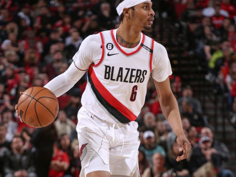 PORTLAND, OR - MARCH 24:  Keon Johnson #6 of the Portland Trail Blazers handles the ball during the game  on March 24, 2023 at the Moda Center Arena in Portland, Oregon. NOTE TO USER: User expressly acknowledges and agrees that, by downloading and or using this photograph, user is consenting to the terms and conditions of the Getty Images License Agreement. Mandatory Copyright Notice: Copyright 2023 NBAE (Photo by Cameron Browne/NBAE via Getty Images)