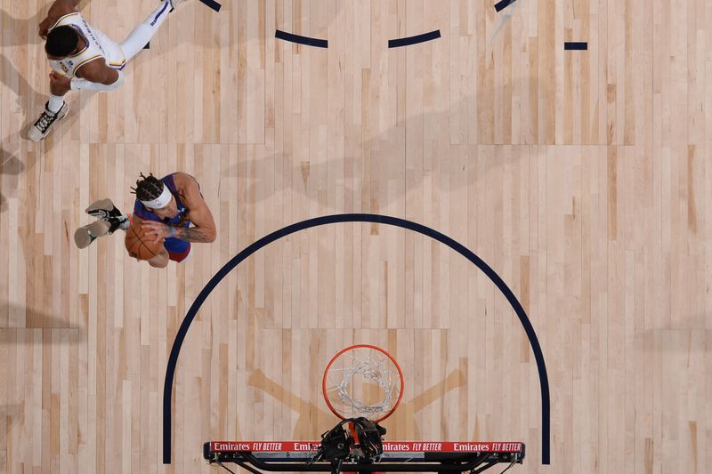 DENVER, CO - APRIL 20: Aaron Gordon #50 of the Denver Nuggets drives to the basket during the game against the Los Angeles Lakers during Round 1 Game 1 of the 2024 NBA Playoffs on April 20, 2024 at the Ball Arena in Denver, Colorado. NOTE TO USER: User expressly acknowledges and agrees that, by downloading and/or using this Photograph, user is consenting to the terms and conditions of the Getty Images License Agreement. Mandatory Copyright Notice: Copyright 2024 NBAE (Photo by Garrett Ellwood/NBAE via Getty Images)