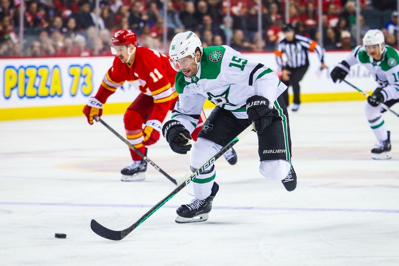 Nov 30, 2023; Calgary, Alberta, CAN; Dallas Stars center Craig Smith (15) skates with the puck against the Calgary Flames during the third period at Scotiabank Saddledome. Mandatory Credit: Sergei Belski-USA TODAY Sports