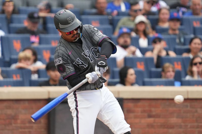 Aug 17, 2024; New York City, New York, USA; New York Mets third baseman Mark Vientos (27) hits a single during the first inning against the Miami Marlins at Citi Field. Mandatory Credit: Lucas Boland-USA TODAY Sports