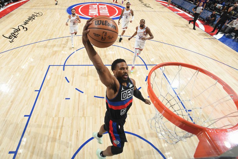 DETROIT, MI - JANUARY 18: Malik Beasley #5 of the Detroit Pistons dunks the ball during the game against the Phoenix Suns on January 18, 2025 at Little Caesars Arena in Detroit, Michigan. NOTE TO USER: User expressly acknowledges and agrees that, by downloading and/or using this photograph, User is consenting to the terms and conditions of the Getty Images License Agreement. Mandatory Copyright Notice: Copyright 2025 NBAE (Photo by Chris Schwegler/NBAE via Getty Images)