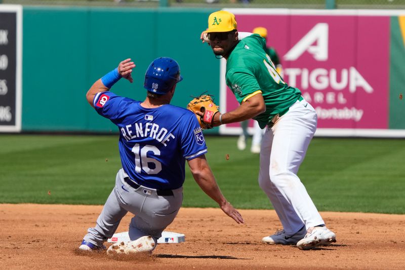 Mar 10, 2024; Mesa, Arizona, USA; Oakland Athletics shortstop Darell Hernaiz (48) gets the force out on Kansas City Royals right fielder Hunter Renfroe (16) in the first inning at Hohokam Stadium. Mandatory Credit: Rick Scuteri-USA TODAY Sports