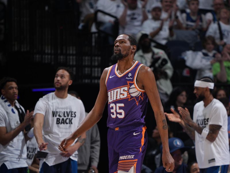 MINNEAPOLIS, MN -  APRIL 23: Kevin Durant #35 of the Phoenix Suns looks on during the game against the Minnesota Timberwolves during Round One Game Two of the 2024 NBA Playoffs on April 23, 2024 at Target Center in Minneapolis, Minnesota. NOTE TO USER: User expressly acknowledges and agrees that, by downloading and or using this Photograph, user is consenting to the terms and conditions of the Getty Images License Agreement. Mandatory Copyright Notice: Copyright 2024 NBAE (Photo by Jordan Johnson/NBAE via Getty Images)