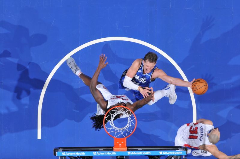 ORLANDO, FL - MARCH 3: Moritz Wagner #21 of the Orlando Magic drives to the basket during the game against the Detroit Pistons on March 3, 2024 at the Kia Center in Orlando, Florida. NOTE TO USER: User expressly acknowledges and agrees that, by downloading and or using this photograph, User is consenting to the terms and conditions of the Getty Images License Agreement. Mandatory Copyright Notice: Copyright 2024 NBAE (Photo by Fernando Medina/NBAE via Getty Images)