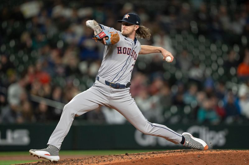 May 29, 2024; Seattle, Washington, USA; Houston Astros reliever Josh Hader (71) delivers a pitch during the ninth inning against the Seattle Mariners at T-Mobile Park. Mandatory Credit: Stephen Brashear-USA TODAY Sports