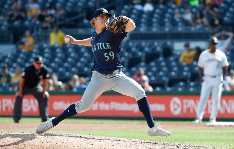 Aug 18, 2024; Pittsburgh, Pennsylvania, USA;  Seattle Mariners relief pitcher Troy Taylor (59) pitches against the Pittsburgh Pirates during the ninth inning at PNC Park. Seattle won 10-3. Mandatory Credit: Charles LeClaire-USA TODAY Sports