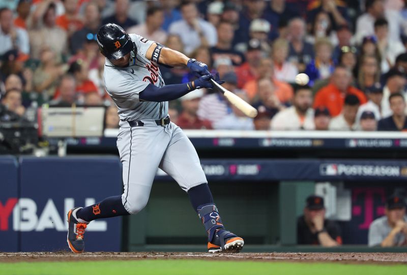 Oct 1, 2024; Houston, Texas, USA; Detroit Tigers outfielder Wenceel Perez (46) hits a single in the second inning in game one of the Wild Card round for the 2024 MLB Playoffs at Minute Maid Park. Mandatory Credit: Troy Taormina-Imagn Images