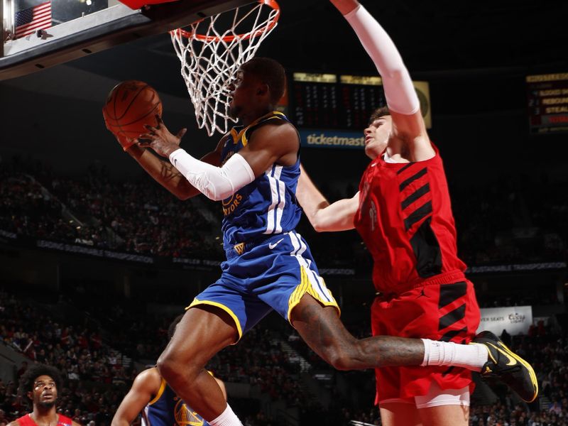 PORTLAND, OR - OCTOBER 23: Jonathan Kuminga #00 of the Golden State Warriors shoots the ball during the game against the Portland Trail Blazers on October 23, 2024 at the Moda Center Arena in Portland, Oregon. NOTE TO USER: User expressly acknowledges and agrees that, by downloading and or using this photograph, user is consenting to the terms and conditions of the Getty Images License Agreement. Mandatory Copyright Notice: Copyright 2024 NBAE (Photo by Cameron Browne/NBAE via Getty Images)