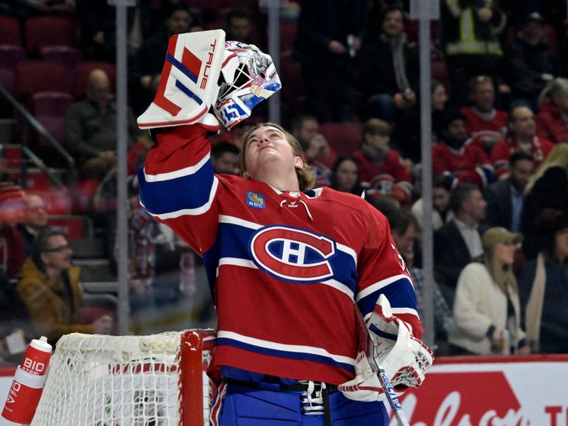 Dec 4, 2023; Montreal, Quebec, CAN; Montreal Canadiens goalie Sam Montembeault (35) puts his mask on during the first period at the Bell Centre. Mandatory Credit: Eric Bolte-USA TODAY Sports