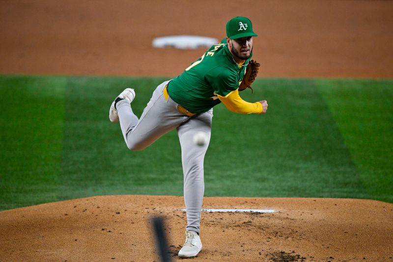 Sep 1, 2024; Arlington, Texas, USA; Oakland Athletics starting pitcher Mitch Spence (40) pitches against the Texas Rangers during the first inning at Globe Life Field. Mandatory Credit: Jerome Miron-USA TODAY Sports