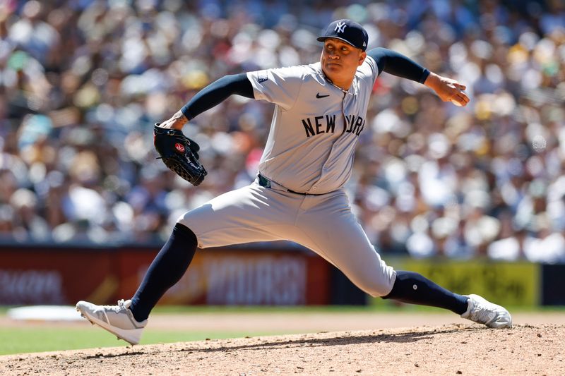 May 26, 2024; San Diego, California, USA; New York Yankees relief pitcher Victor Gonzalez (47) throws a pitch during the sixth inning against the San Diego Padres at Petco Park. Mandatory Credit: David Frerker-USA TODAY Sports