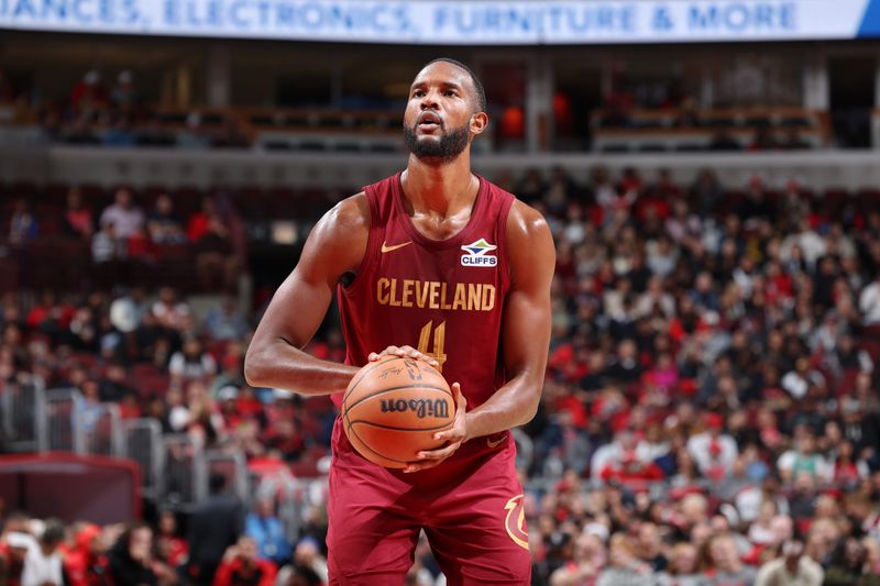 CHICAGO, IL - OCTOBER 18: Evan Mobley #4 of the Cleveland Cavaliers shots a free throw during the game against the Chicago Bulls on October 18, 2024 at United Center in Chicago, Illinois. NOTE TO USER: User expressly acknowledges and agrees that, by downloading and or using this photograph, User is consenting to the terms and conditions of the Getty Images License Agreement. Mandatory Copyright Notice: Copyright 2023 NBAE (Photo by Jeff Haynes/NBAE via Getty Images)