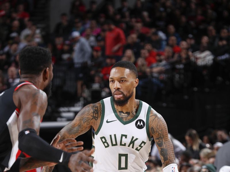 PORTLAND, OR - JANUARY 31:  Damian Lillard #0 of the Milwaukee Bucks handles the ball during the game  on January 31, 2024 at the Moda Center Arena in Portland, Oregon. NOTE TO USER: User expressly acknowledges and agrees that, by downloading and or using this photograph, user is consenting to the terms and conditions of the Getty Images License Agreement. Mandatory Copyright Notice: Copyright 2024 NBAE (Photo by Cameron Browne/NBAE via Getty Images)