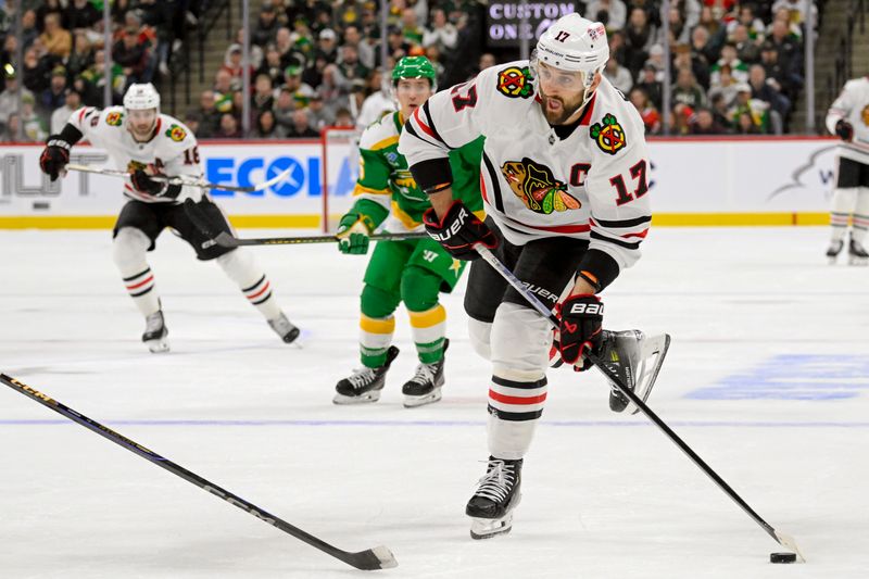 Nov 29, 2024; Saint Paul, Minnesota, USA;  Chicago Blackhawks forward Nick Foligno (17) looks to shoot against the Minnesota Wild during the third period at Xcel Energy Center. Mandatory Credit: Nick Wosika-Imagn Images