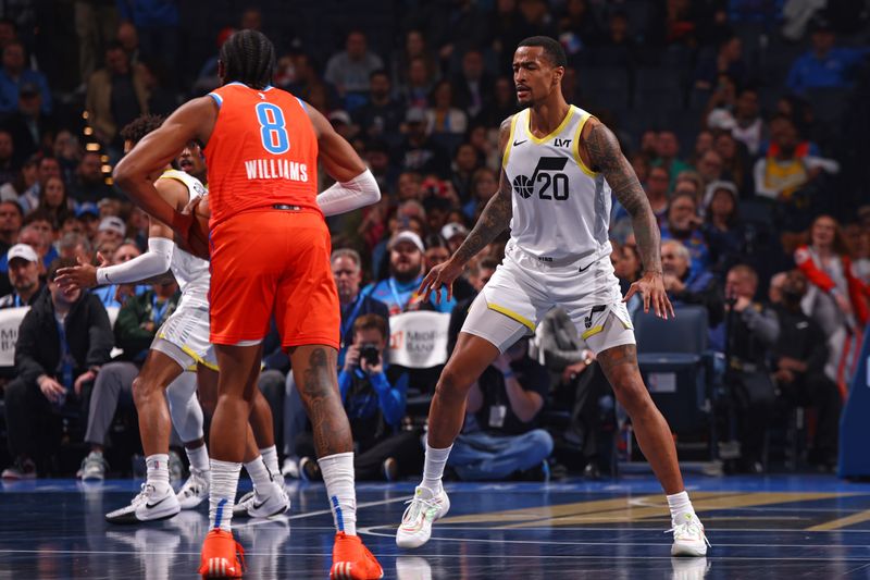 OKLAHOMA CITY, OK - DECEMBER 3: John Collins #20 of the Utah Jazz plays defense during the game against the Oklahoma City Thunder during the Emirates NBA Cup game on on December 3, 2024 at Paycom Center in Oklahoma City, Oklahoma. NOTE TO USER: User expressly acknowledges and agrees that, by downloading and or using this photograph, User is consenting to the terms and conditions of the Getty Images License Agreement. Mandatory Copyright Notice: Copyright 2024 NBAE (Photo by Zach Beeker/NBAE via Getty Images)