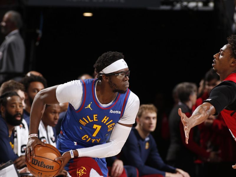 PORTLAND, OR - MARCH 23: Reggie Jackson #7 of the Denver Nuggets dribbles the ball during the game against the Portland Trail Blazers on March 23, 2024 at the Moda Center Arena in Portland, Oregon. NOTE TO USER: User expressly acknowledges and agrees that, by downloading and or using this photograph, user is consenting to the terms and conditions of the Getty Images License Agreement. Mandatory Copyright Notice: Copyright 2024 NBAE (Photo by Cameron Browne/NBAE via Getty Images)