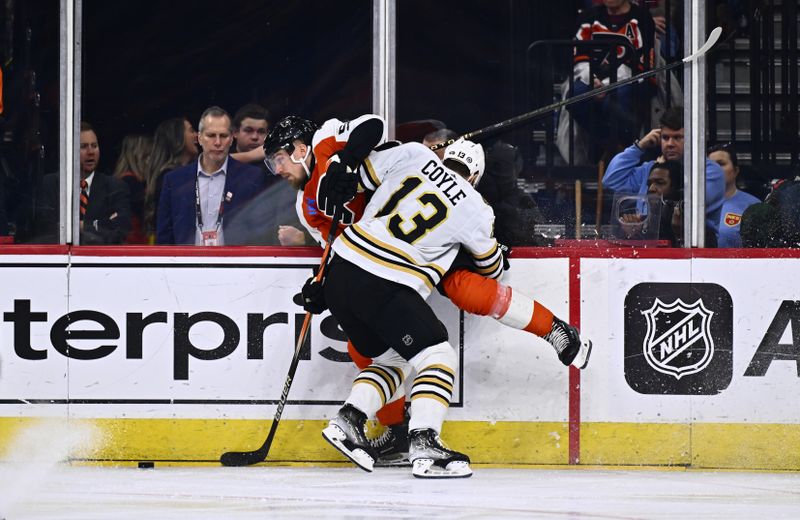 Jan 27, 2024; Philadelphia, Pennsylvania, USA; Boston Bruins center Charlie Coyle (13) hits Philadelphia Flyers defenseman Rasmus Ristolainen (55) in the first period at Wells Fargo Center. Mandatory Credit: Kyle Ross-USA TODAY Sports