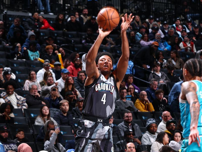 BROOKLYN, NY - FEBRUARY 10: Reece Beekman #4 of the Brooklyn Nets shoots a three point basket during the game against the Charlotte Hornets on February 10, 2025 at Barclays Center in Brooklyn, New York. NOTE TO USER: User expressly acknowledges and agrees that, by downloading and or using this Photograph, user is consenting to the terms and conditions of the Getty Images License Agreement. Mandatory Copyright Notice: Copyright 2025 NBAE (Photo by David L. Nemec/NBAE via Getty Images)