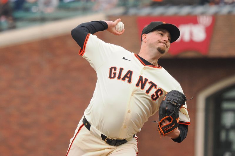 Apr 24, 2024; San Francisco, California, USA; San Francisco Giants relief pitcher Luke Jackson (77) pitches the ball against the New York Mets during the seventh inning at Oracle Park. Mandatory Credit: Kelley L Cox-USA TODAY Sports