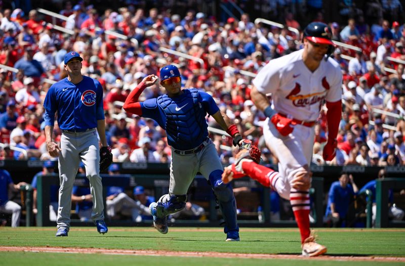 Jul 30, 2023; St. Louis, Missouri, USA;  Chicago Cubs catcher Miguel Amaya (6) throws out St. Louis Cardinals catcher Andrew Knizner (7) during the sixth inning at Busch Stadium. Mandatory Credit: Jeff Curry-USA TODAY Sports