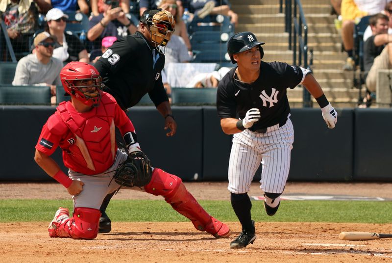 Mar 13, 2024; Tampa, Florida, USA; New York Yankees shortstop Anthony Volpe (11) hits a 2-RBI double during the fourth inning against the Boston Red Sox at George M. Steinbrenner Field. Mandatory Credit: Kim Klement Neitzel-USA TODAY Sports