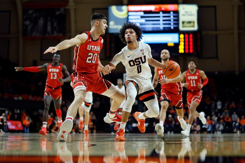 Jan 26, 2023; Corvallis, Oregon, USA; Oregon State Beavers guard Jordan Pope (0) dribbles the ball while defended by Utah Utes guard Lazar Stefanovic (20) during the first half at Gill Coliseum. Mandatory Credit: Soobum Im-USA TODAY Sports