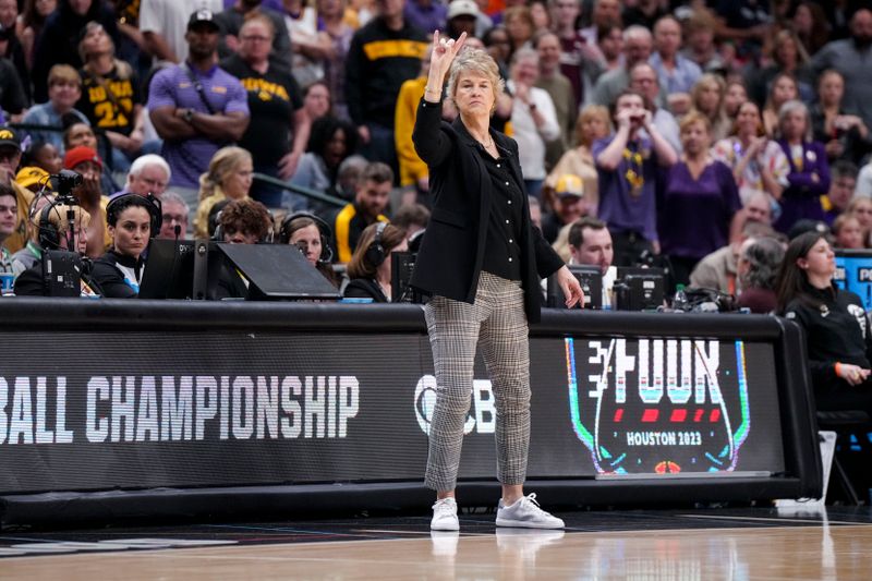 Apr 2, 2023; Dallas, TX, USA; Iowa Hawkeyes head coach Lisa Bluder reacts from the sideline in the game against the LSU Lady Tigers in the second half during the final round of the Women's Final Four NCAA tournament at the American Airlines Center. Mandatory Credit: Kirby Lee-USA TODAY Sports