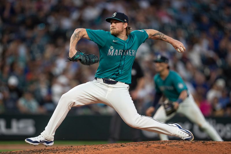 May 11, 2024; Seattle, Washington, USA; Seattle Mariners reliever Gabe Speier (55) delivers a pitch during the eighth inning against the Oakland Athletics at T-Mobile Park. Mandatory Credit: Stephen Brashear-USA TODAY Sports