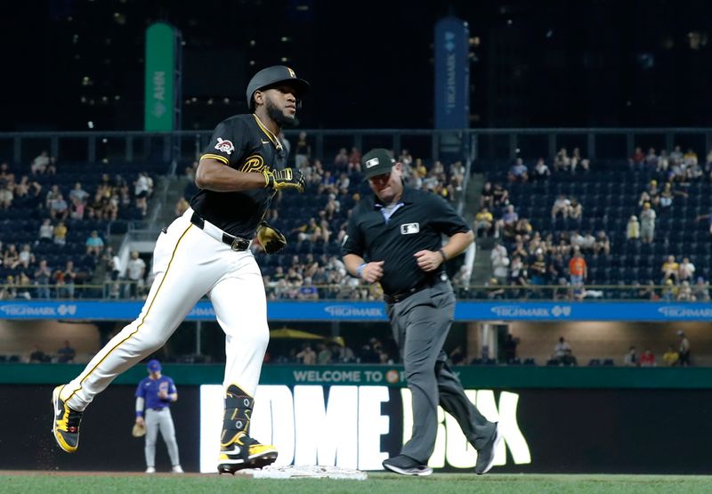 Aug 27, 2024; Pittsburgh, Pennsylvania, USA;  Pittsburgh Pirates right fielder Bryan De La Cruz (41) circles the bases on a solo home run against the Chicago Cubs during the sixth inning at PNC Park. Mandatory Credit: Charles LeClaire-USA TODAY Sports