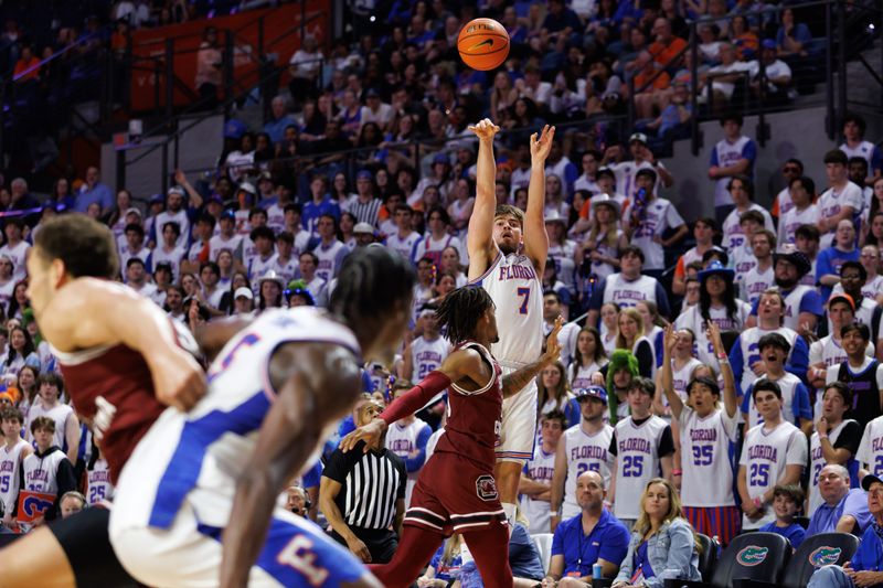 Feb 15, 2025; Gainesville, Florida, USA; Florida Gators guard Urban Klavzar (7) attempts a three-point basket against the South Carolina Gamecocks during the second half at Exactech Arena at the Stephen C. O'Connell Center. Mandatory Credit: Matt Pendleton-Imagn Images