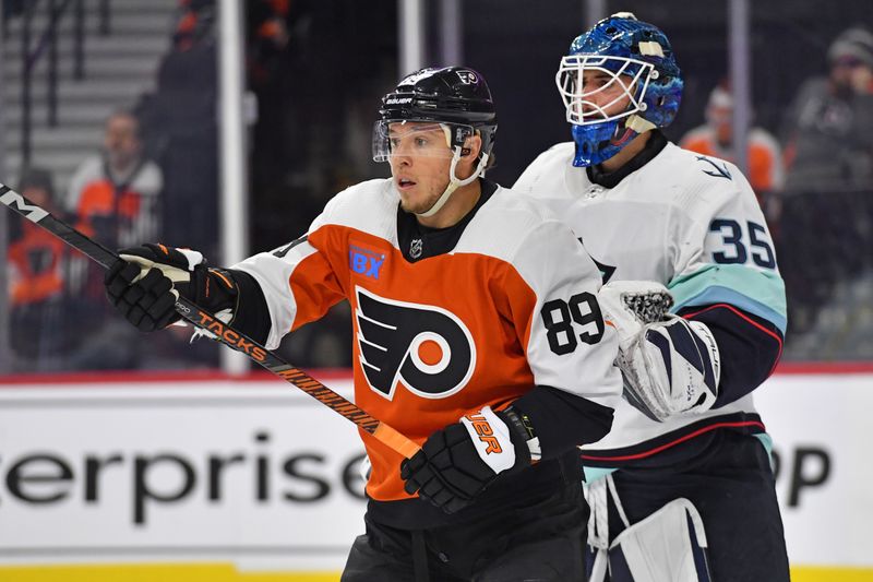 Feb 10, 2024; Philadelphia, Pennsylvania, USA; Philadelphia Flyers right wing Cam Atkinson (89) stands in for too Seattle Kraken goaltender Joey Daccord (35) during the first period at Wells Fargo Center. Mandatory Credit: Eric Hartline-USA TODAY Sports