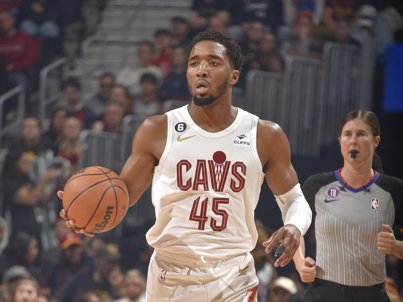 CLEVELAND, OH - MARCH 31:  Donovan Mitchell #45 of the Cleveland Cavaliers goes to the basket during the game on March 31, 2023 at Rocket Mortgage FieldHouse in Cleveland, Ohio. NOTE TO USER: User expressly acknowledges and agrees that, by downloading and/or using this Photograph, user is consenting to the terms and conditions of the Getty Images License Agreement. Mandatory Copyright Notice: Copyright 2023 NBAE (Photo by David Liam Kyle/NBAE via Getty Images)